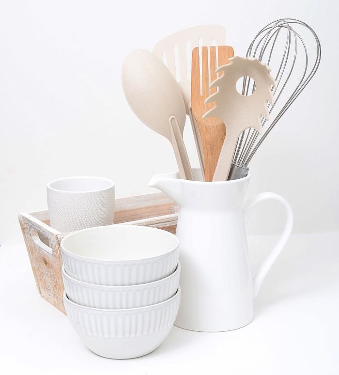 category-04 Simple white kitchenware set with wooden utensils in a minimalist style.